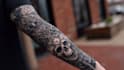 create a full sleeve tattoo