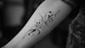 custom an abstract black tattoo design
