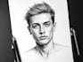 traditionally draw your picture using charcoal pencil