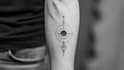 create arabic and persian minimal calligraphy tattoo