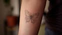 create a cute minimalistic line art tattoo design