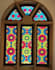 create a realistic stained glass panel mockup with glowing light effect