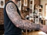 create sleeve tattoo design in geometric style