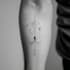create a minimalist fine line tattoo design