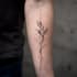 create a minimalist fine line tattoo design
