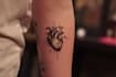draw a custom realism styled tattoo design