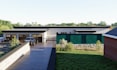 build 3d modern forest house,stone facade, elevated deck, retaining wall,cgi art