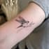 create a minimalist fine line tattoo design