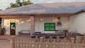 design an outdoor living space with kitchen, BBQ and pergola