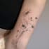 design a minimalist fine line tattoo