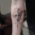 design a minimalist fine line tattoo
