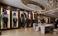 redesign luxury retail store with reception desk counter custom logo wall setup