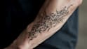 not design an average calligraphy tattoo
