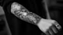 make a realistic black and white tattoo design for you