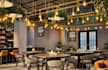create photorealistic cafe, restaurant, and bar interior render,desert shops,cgi