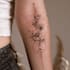 design a delicate fine line tattoo lettering