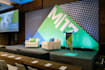 design eye catching trade show banner, backdrop, and booth