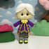 make a cute plush doll using felt fabric with beads eyes