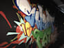 paint real graffiti art on the street wall
