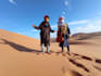 wish you a happy birthday in the sahara desert with a guitar