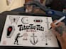 design a minimal black traditional tattoo design for ten dollars