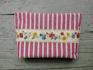 sew a cosmetic bag or a cosmetic bag with embroidery