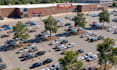 design and render realistic outdoor parking lot and garage