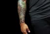 create a geometric sleeve tattoo design