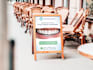 design professional sidewalk sign, sandwich board, and a frame sign