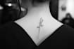create arabic and persian minimal calligraphy tattoo