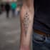 create sleeve tattoo design in geometric style