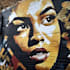 paint real graffiti art on the street wall