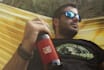 put label, logo on 3d alcohol bottle mockups like beer, wine