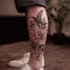create a tattoo design for leg sleeve