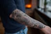 do premium trash polka design , sleeve tattoo