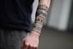 create sleeve tattoo design in geometric style