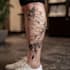 create a tattoo design for leg sleeve