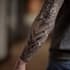 create sleeve tattoo design in geometric style