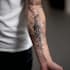 create sleeve tattoo design in geometric style