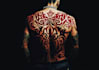 design half back tribal tattoo with authentic pattern