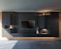 design a modern custom TV wall unit and media wall in 3d