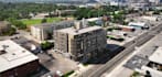 recreate mixed use building,urban apartment complex,street level retail, render