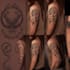 design small tribal tattoo with elegant pattern