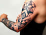 create sleeve tattoo design in geometric style