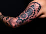 create a full sleeve tattoo