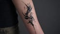 custom an abstract black tattoo design