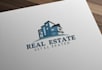 design stunning real estate logo