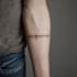 design a minimalist fine line tattoo