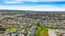 visualize 3d residential suburb,roofs solar panel,townhouses,aerial shots render