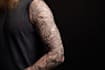 create sleeve tattoo design in geometric style
